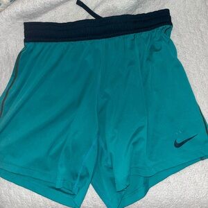 Nike long women’s blue dri fit shorts